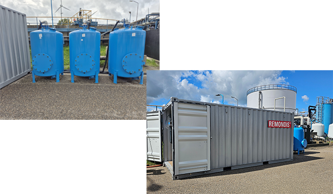 A large grey container featuring the REMONDIS logo, situated on an industrial site.